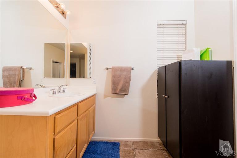 1892 Ribera Drive Oxnard, CA 93030 - Photo 34 of 34 a bathroom with a sink and mirror