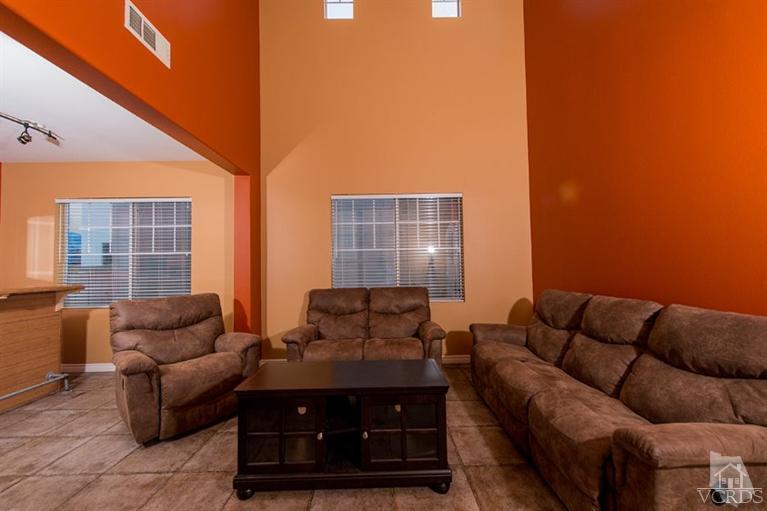 1892 Ribera Drive Oxnard, CA 93030 - Photo 8 of 34 a living room with furniture and a window