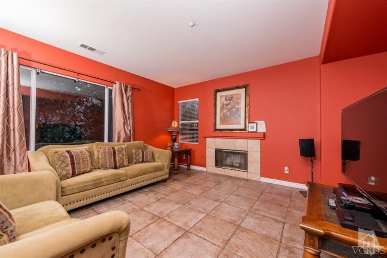 1892 Ribera Drive Oxnard, CA 93030 - Photo 10 of 34 a living room with furniture and a fireplace