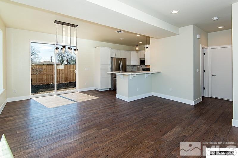 711 Roberts Street Reno, NV 89502 - Photo 3 of 13 a view of a kitchen with wooden floor and a kitchen