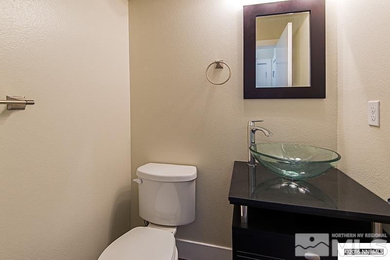 711 Roberts Street Reno, NV 89502 - Photo 7 of 13 a bathroom with a toilet and a sink