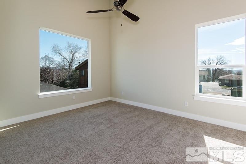 711 Roberts Street Reno, NV 89502 - Photo 9 of 13 a view of an empty room with a window