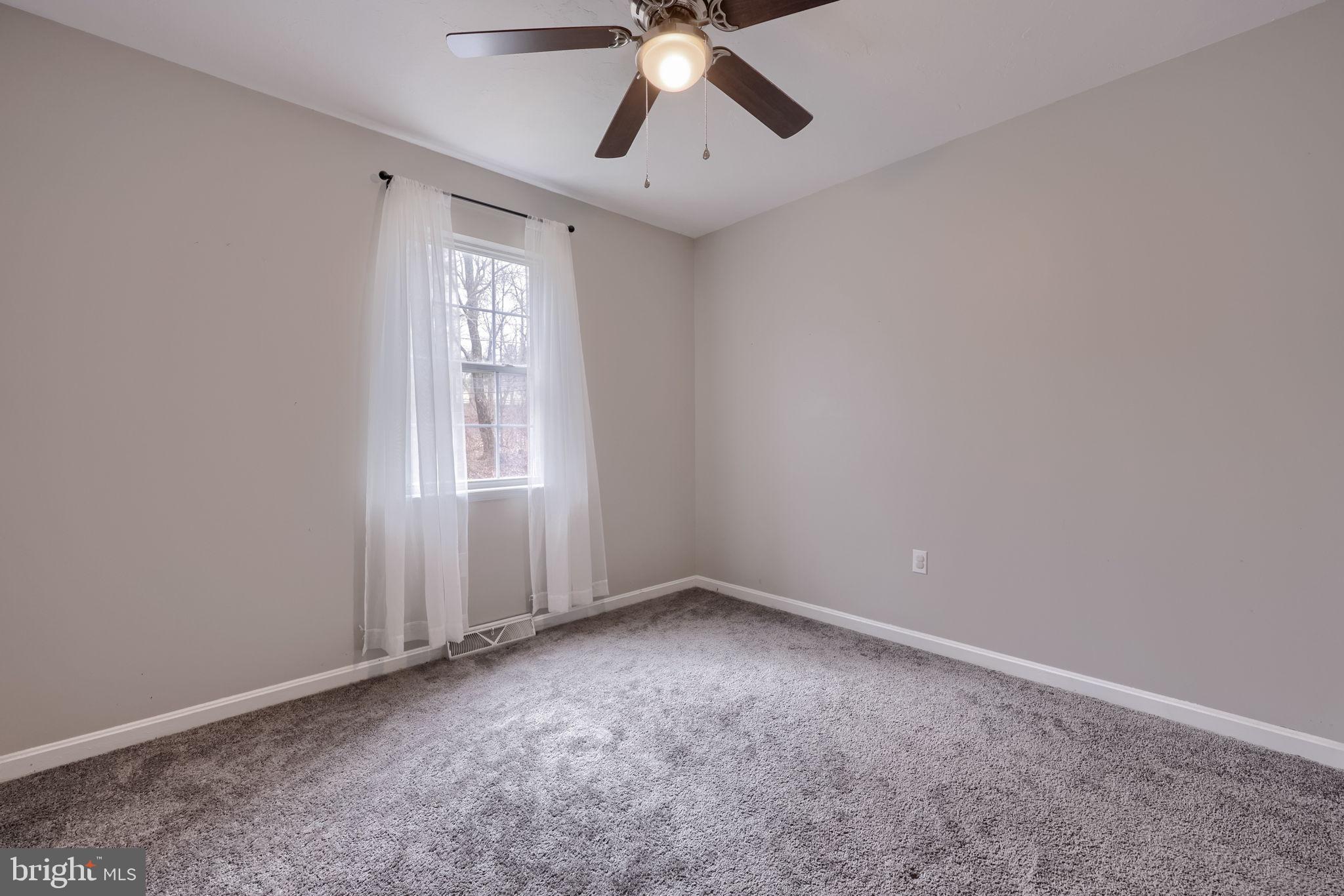 3333 Druck Valley Road York, PA 17406 - Photo 25 of 40 Bright and airy room with soft gray tones.