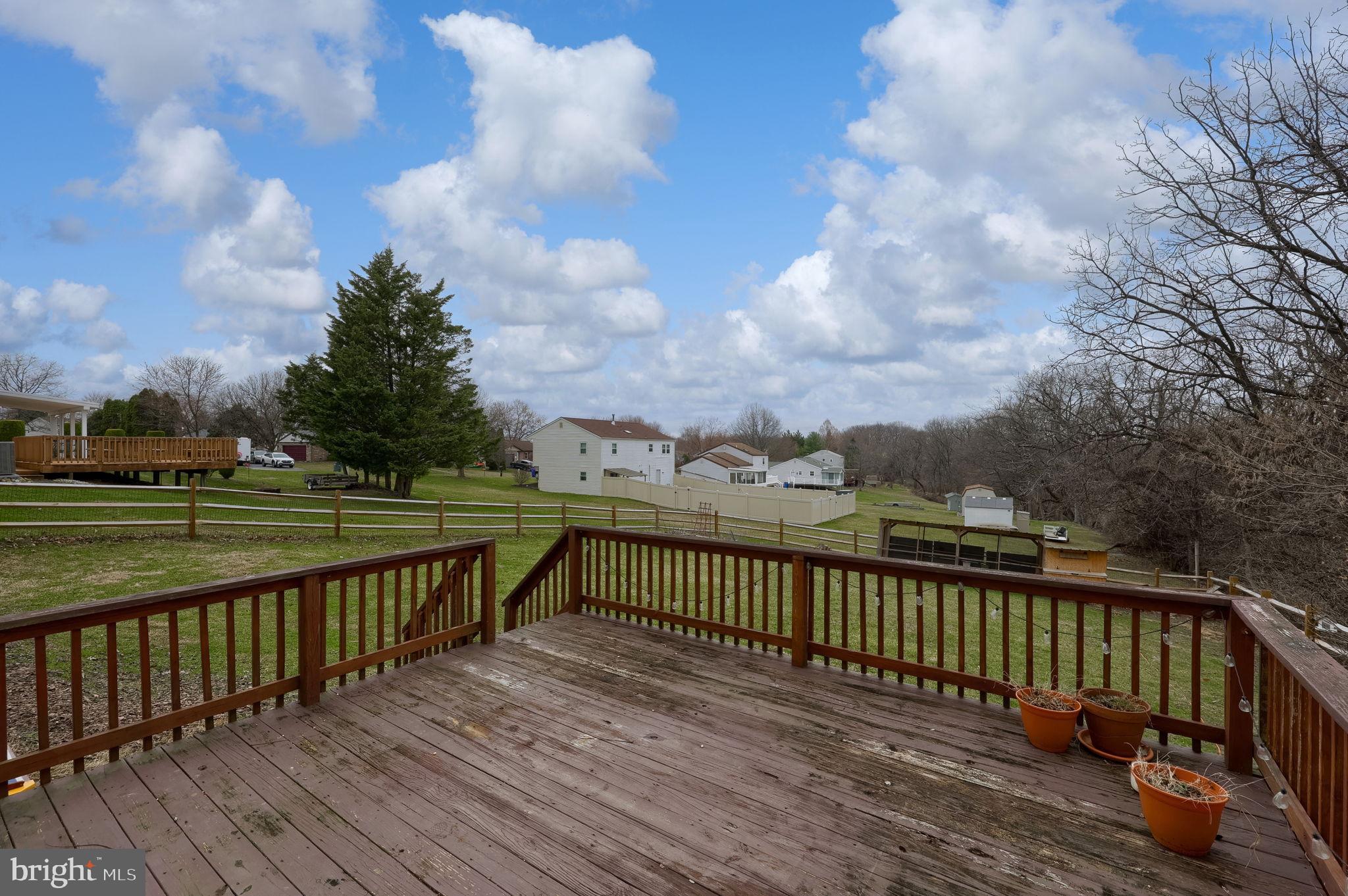 3333 Druck Valley Road York, PA 17406 - Photo 4 of 40 Spacious deck with serene countryside views.