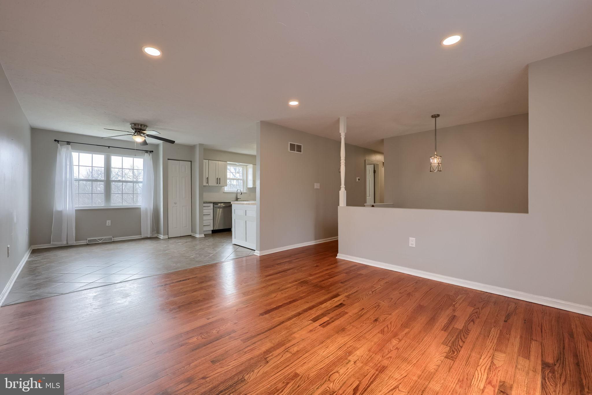 3333 Druck Valley Road York, PA 17406 - Photo 9 of 40 Spacious living area with warm hardwood floors.