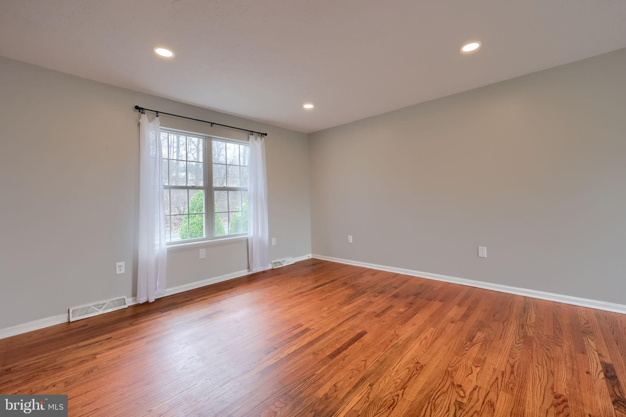 3333 Druck Valley Road York, PA 17406 - Photo 10 of 40 Spacious room with natural light and warmth.