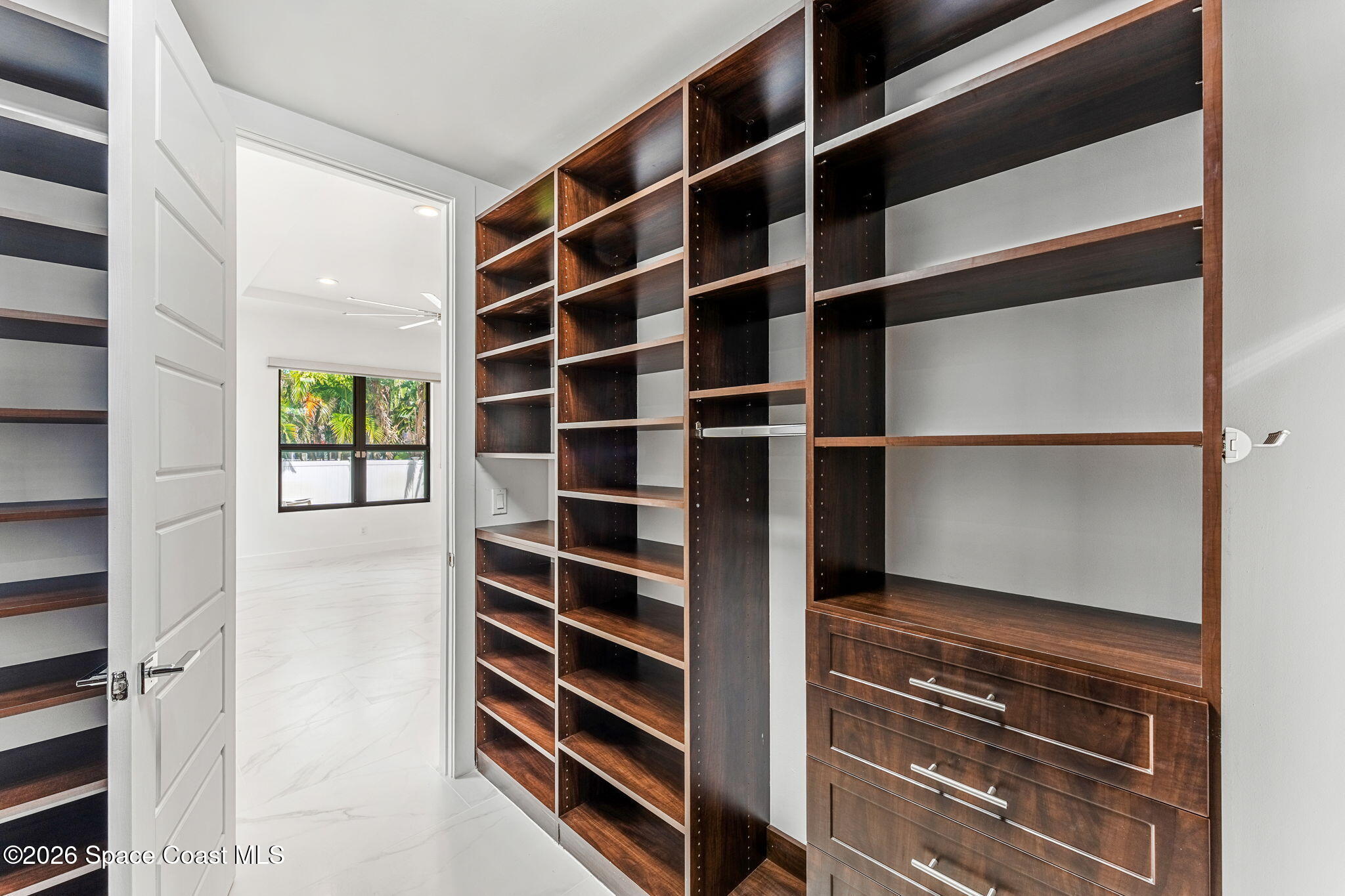 2355 North Riverside Drive Indialantic, FL 32903 - Photo 22 of 70 a view of walk in closet with empty racks