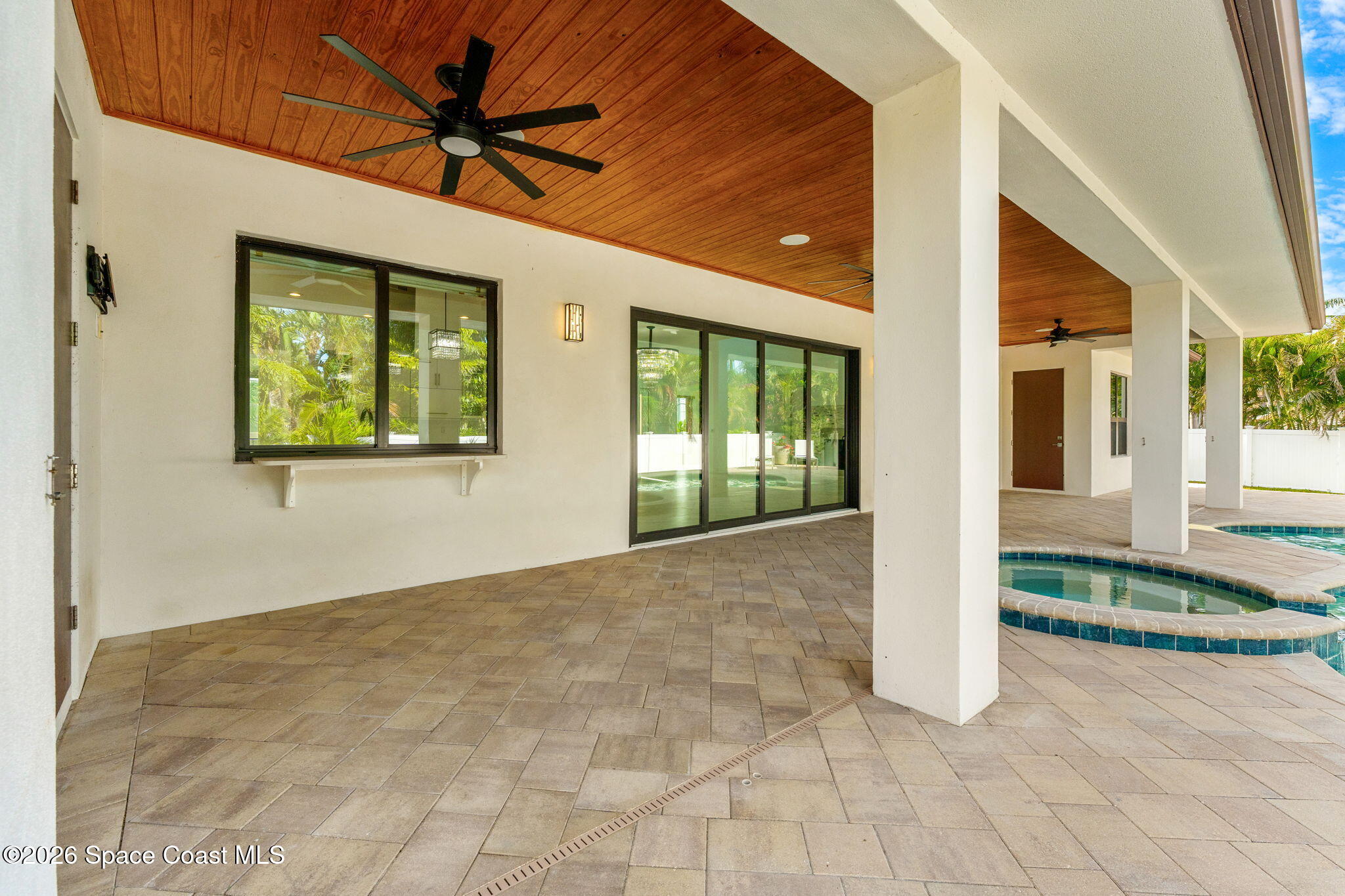 2355 North Riverside Drive Indialantic, FL 32903 - Photo 40 of 70 a view of a livingroom with a ceiling fan and window