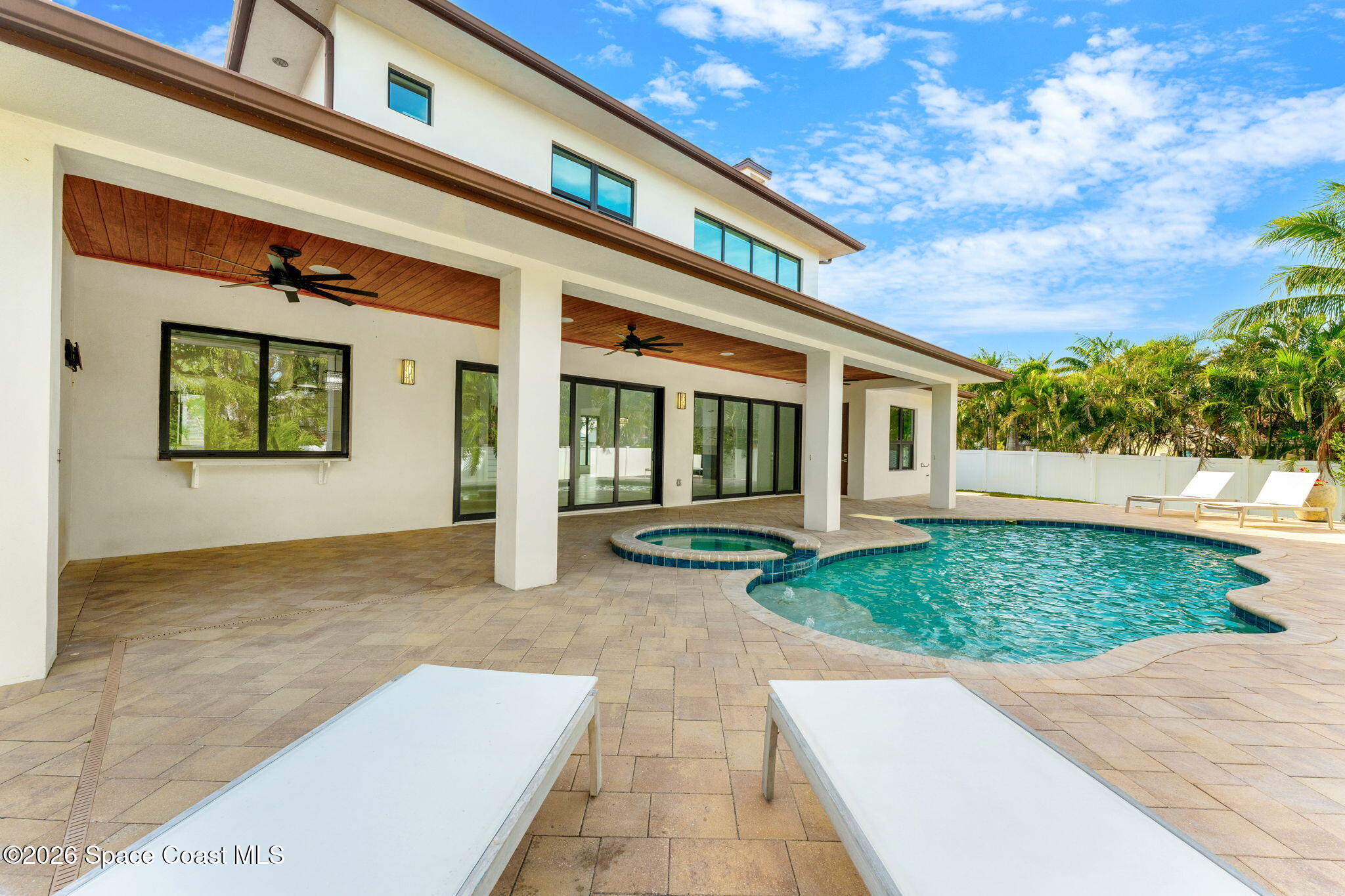 2355 North Riverside Drive Indialantic, FL 32903 - Photo 45 of 70 a view of a house with a yard