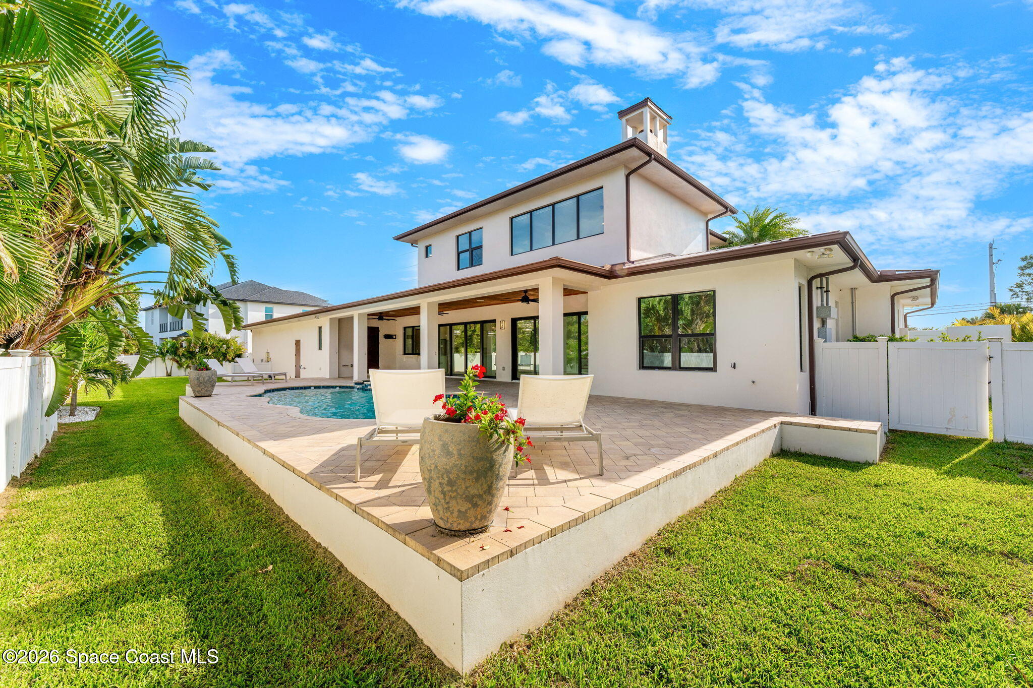 2355 North Riverside Drive Indialantic, FL 32903 - Photo 48 of 70 a front view of a house with a yard