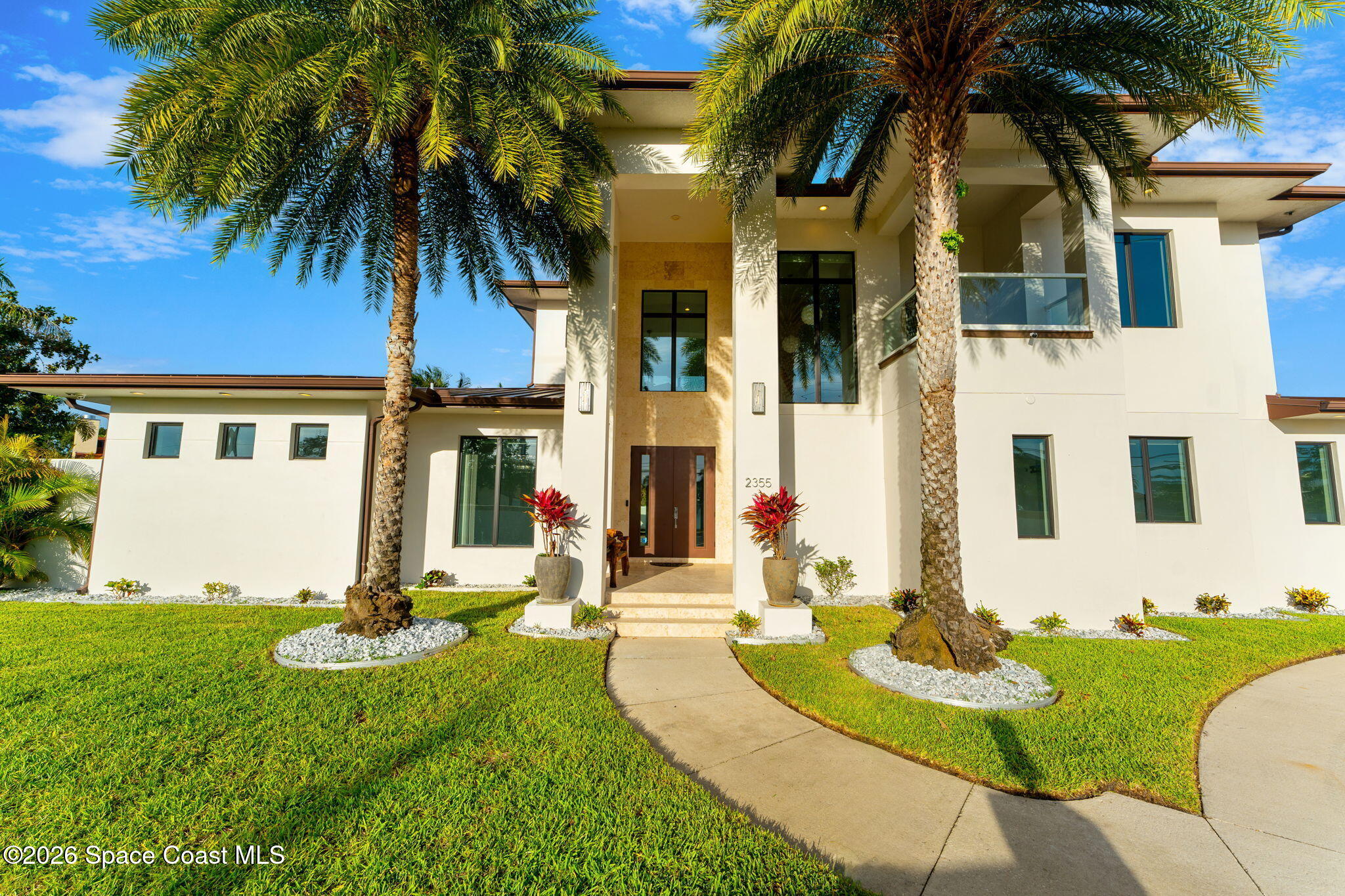2355 North Riverside Drive Indialantic, FL 32903 - Photo 59 of 70 front view of a house with a yard