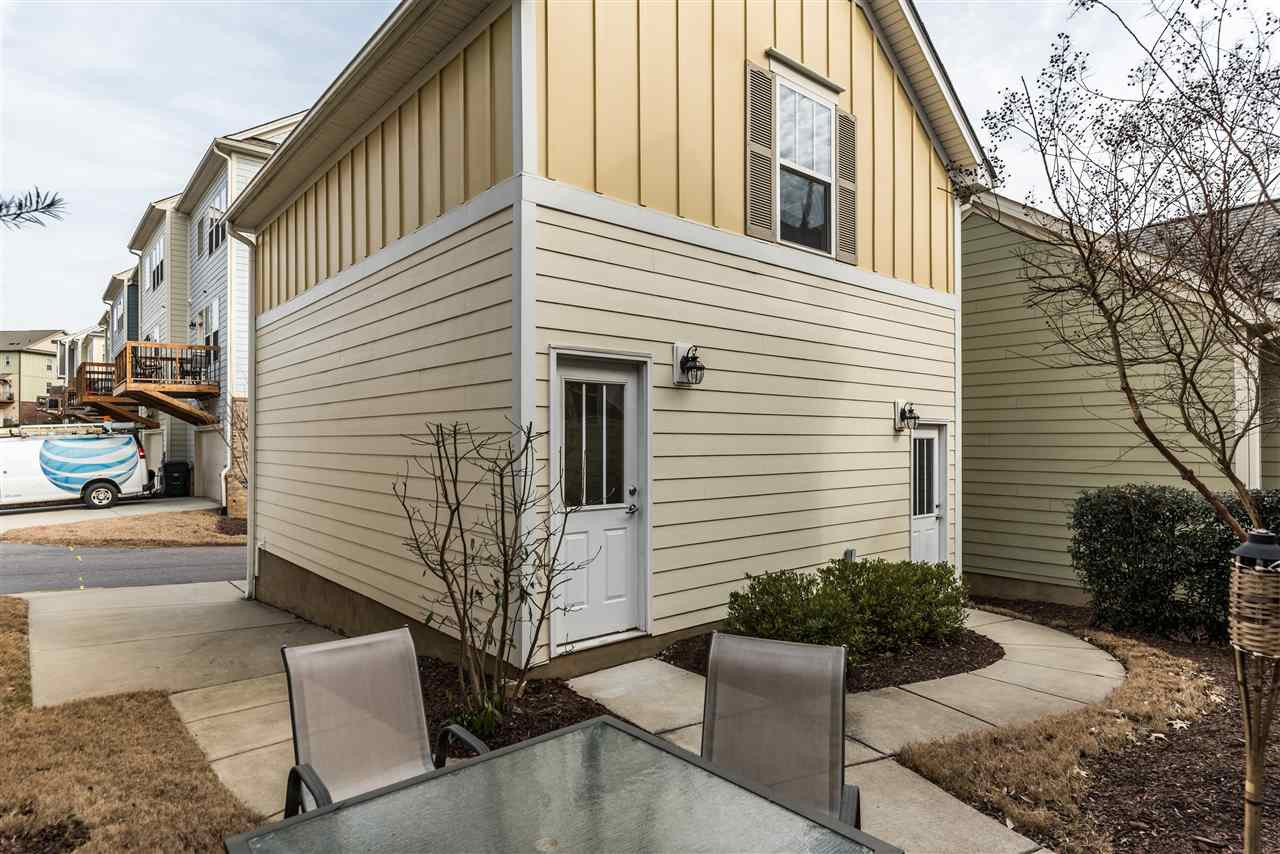 1413 Van Page Boulevard Raleigh, NC 27607 - Photo 21 of 25 EXTERIOR VIEW OF DETACHED GARAGE WITH FINISHED BONUS ROOM ON TOP. BACK EXTERIOR