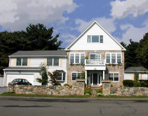 54 Ralsey Road South Stamford, CT 06902 - Photo 1 of 1 a front view of a house with lots of windows and plants