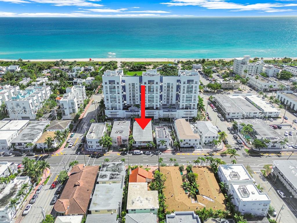 7625 Harding Avenue, Unit 1 Miami Beach, FL 33141 - Photo 1 of 23 an aerial view of residential houses with outdoor space