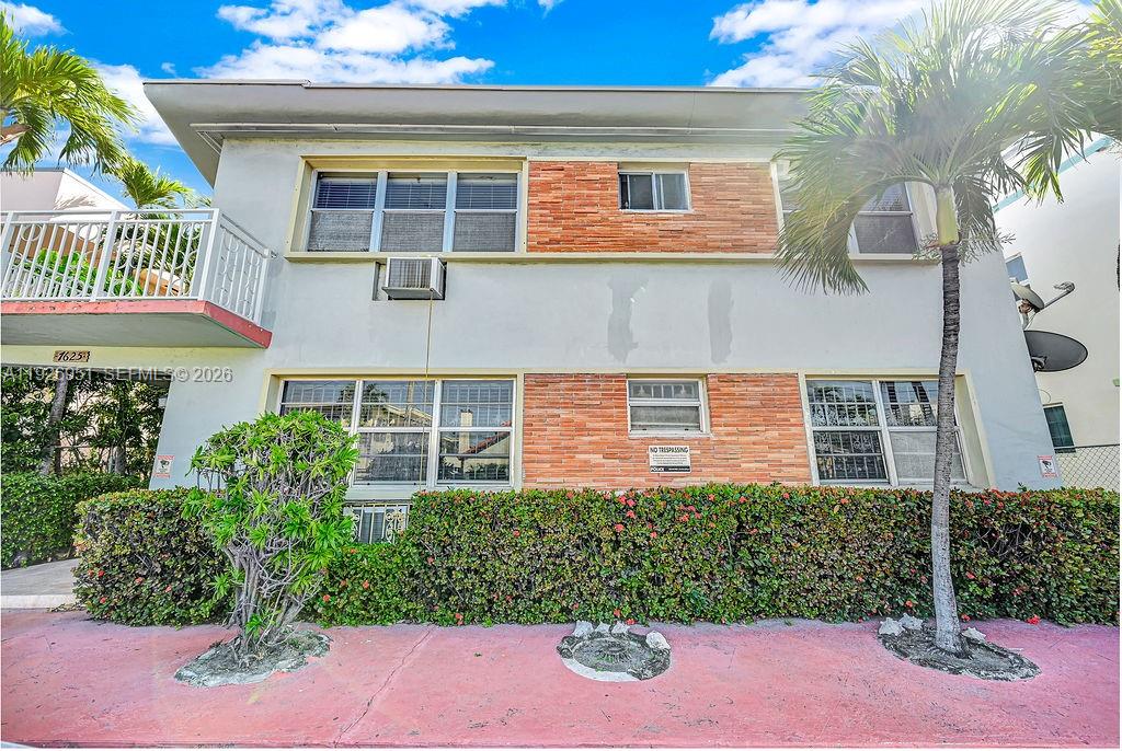 7625 Harding Avenue, Unit 1 Miami Beach, FL 33141 - Photo 2 of 23 a front view of a building