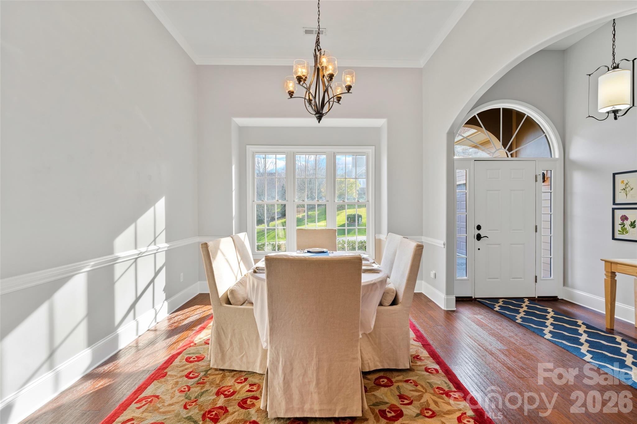 160 Fairway Falls Road Mills River, NC 28759 - Photo 18 of 43 a view of a dining room with furniture window and wooden floor