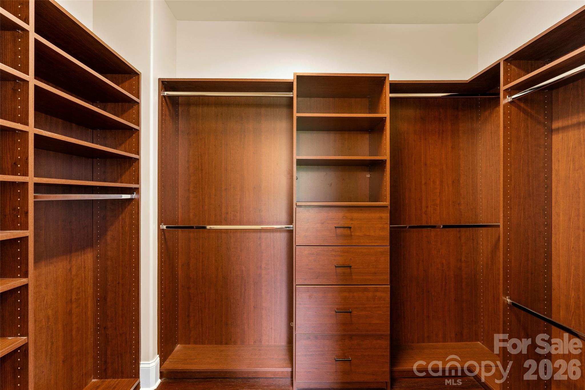 160 Fairway Falls Road Mills River, NC 28759 - Photo 24 of 43 a view of walk in closet with empty racks