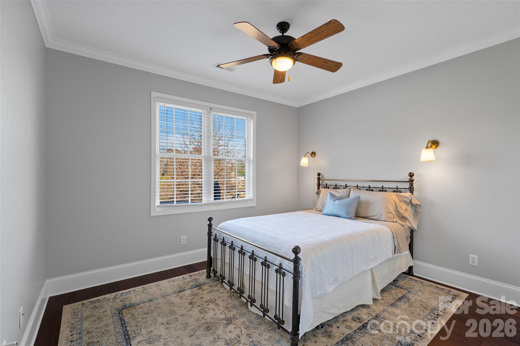 160 Fairway Falls Road Mills River, NC 28759 - Photo 26 of 43 a bedroom with a bed a window and a chandelier