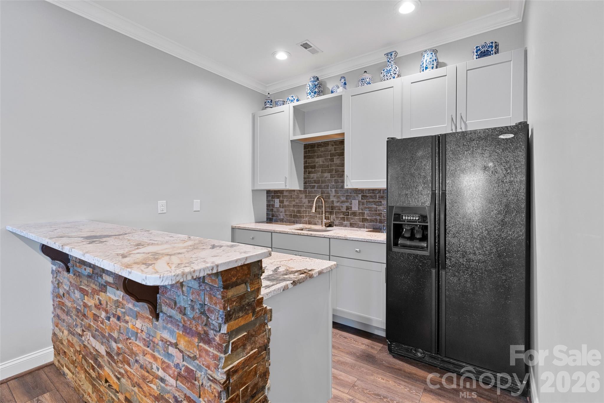 160 Fairway Falls Road Mills River, NC 28759 - Photo 32 of 43 a kitchen with a refrigerator and a sink