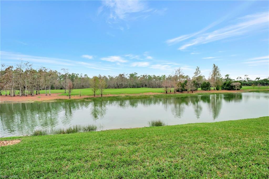 8630 Cedar Hammock Circle, Unit 1012 Naples, FL 34112 - Photo 28 of 37 a view of a lake