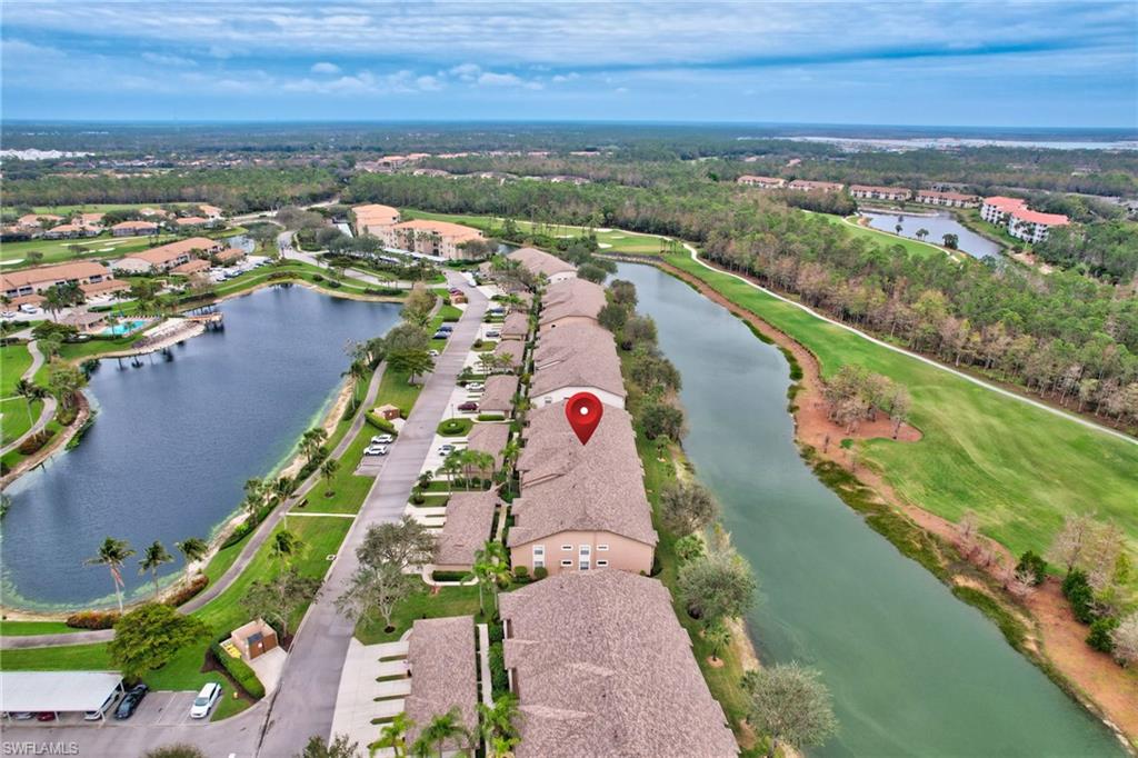 8630 Cedar Hammock Circle, Unit 1012 Naples, FL 34112 - Photo 32 of 37 a view of city and ocean