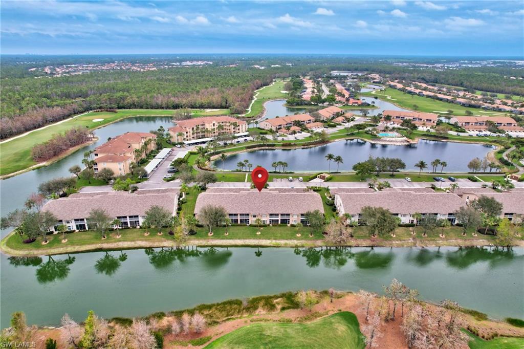 8630 Cedar Hammock Circle, Unit 1012 Naples, FL 34112 - Photo 35 of 37 a view of a city with lake