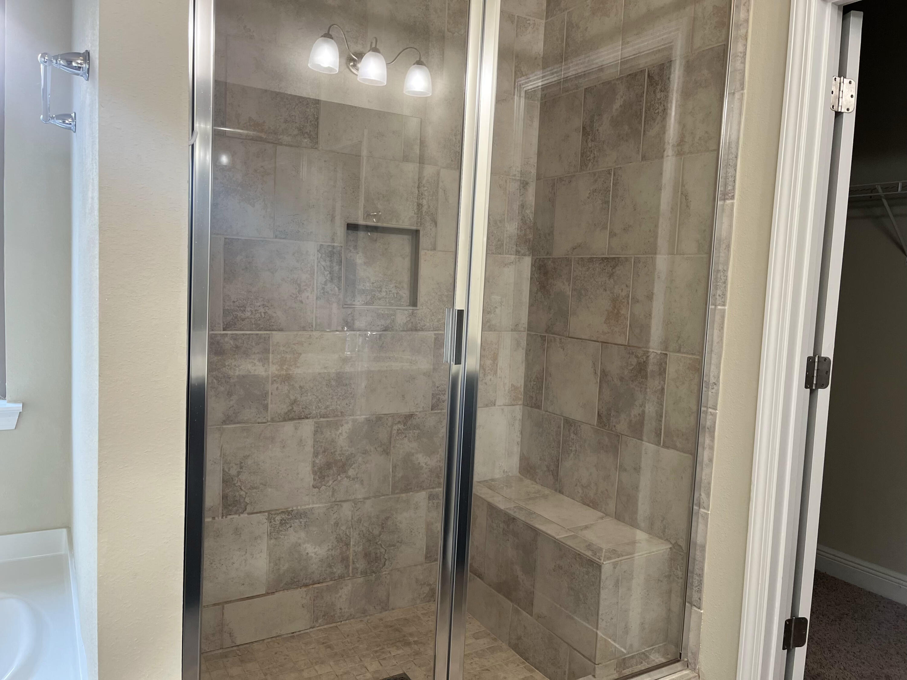 671 Teal Street Crestview, FL 32539 - Photo 17 of 22 a bathroom with a shower