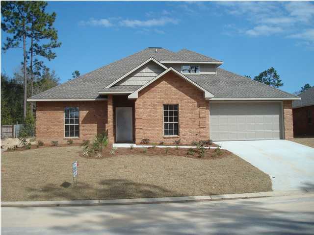 4620 Hermosa Road Crestview, FL 32539 - Photo 1 of 4 a front view of a house with garden