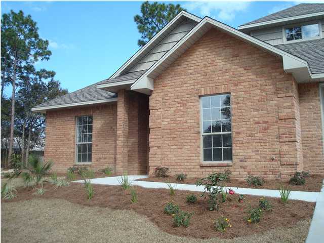 4620 Hermosa Road Crestview, FL 32539 - Photo 3 of 4 a front view of a house with a yard