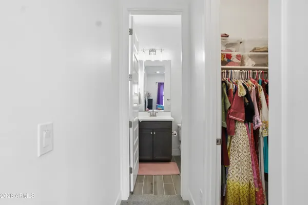 a bathroom with a sink toilet a mirror and shower