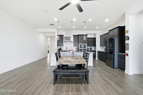 a view of a living room and chandelier