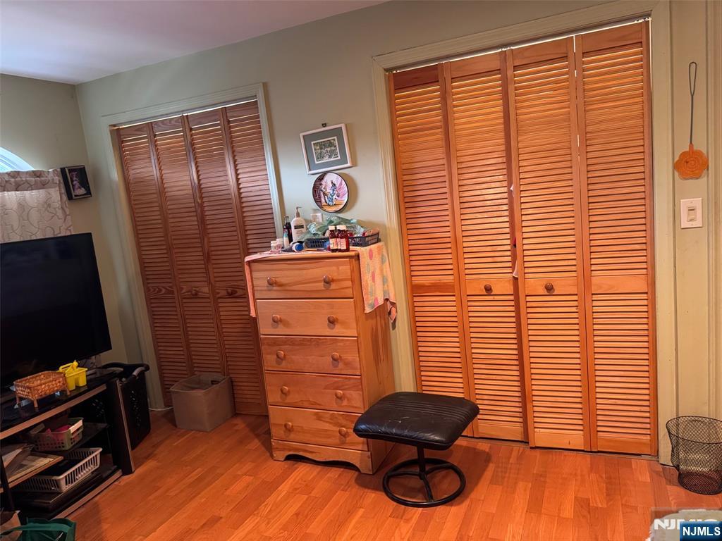 266 Hamilton Road Teaneck, NJ 07666 - Photo 14 of 27 a room with furniture and wooden floor