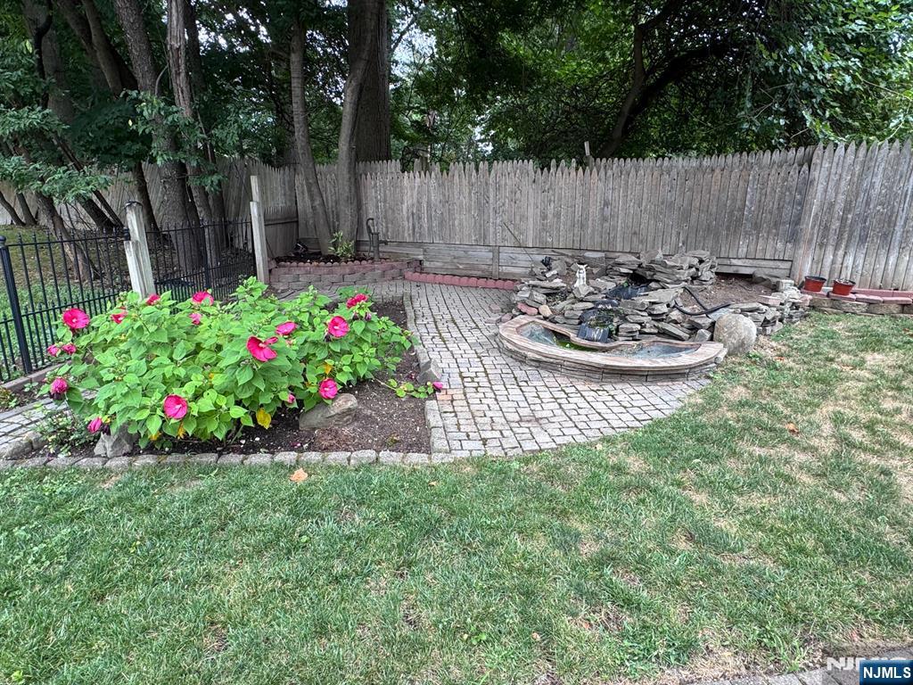 266 Hamilton Road Teaneck, NJ 07666 - Photo 19 of 27 a view of a backyard with sitting area