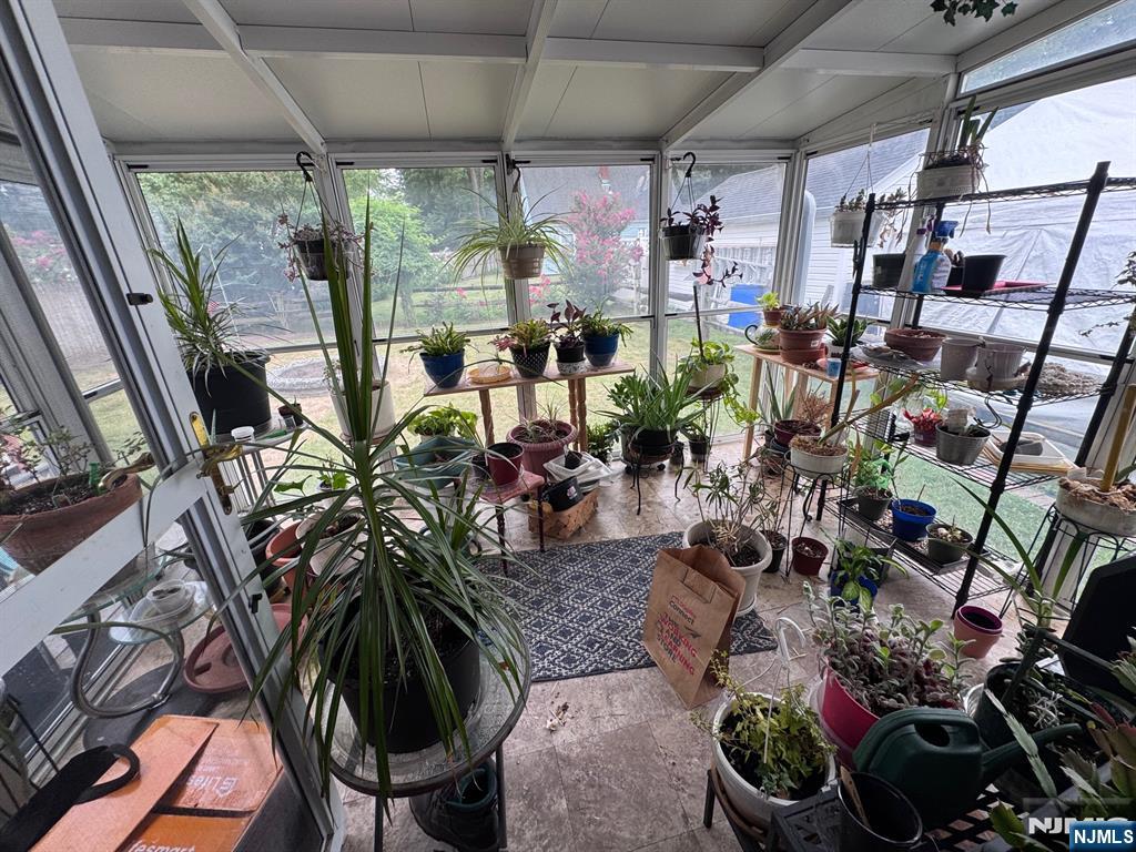 266 Hamilton Road Teaneck, NJ 07666 - Photo 24 of 27 a room with lots of potted plants