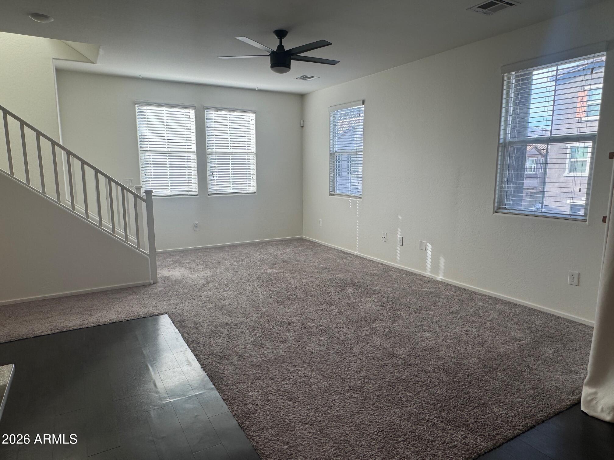 5851 South 23rd Way Phoenix, AZ 85040 - Photo 4 of 24 an empty room with windows