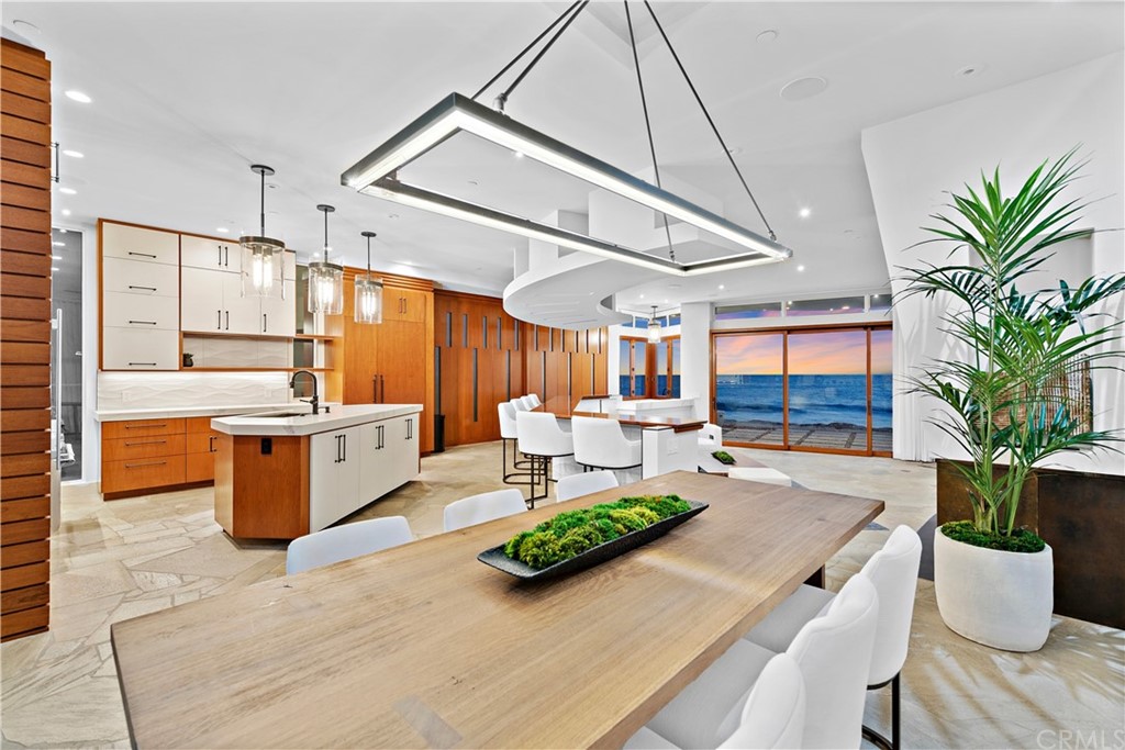 35301 Beach Road Dana Point, CA 92624 - Photo 1 of 1 a kitchen with a table and chairs