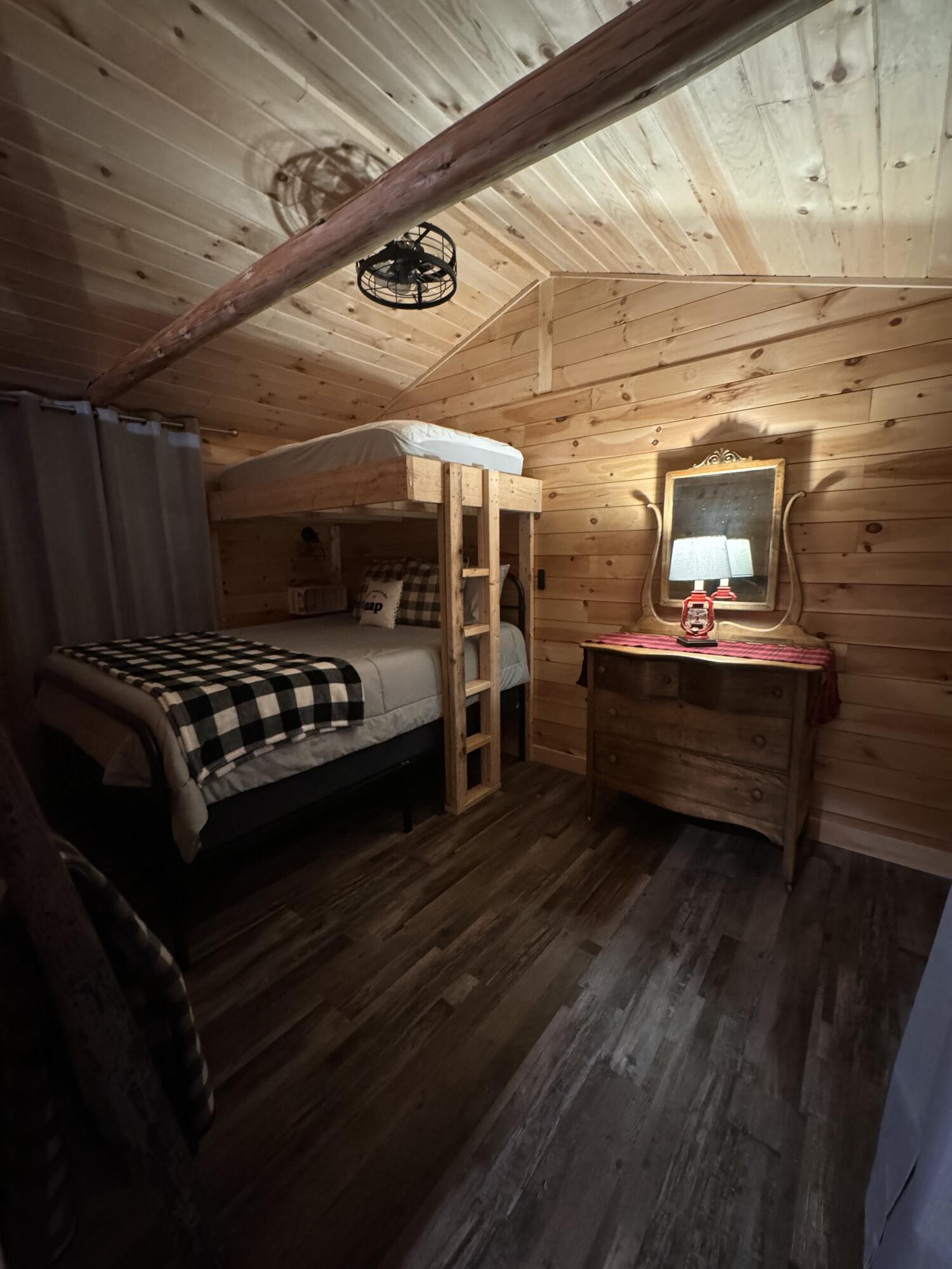 1750 Houston Road Lincoln, ME 04457 - Photo 7 of 31 Bunk room at night
