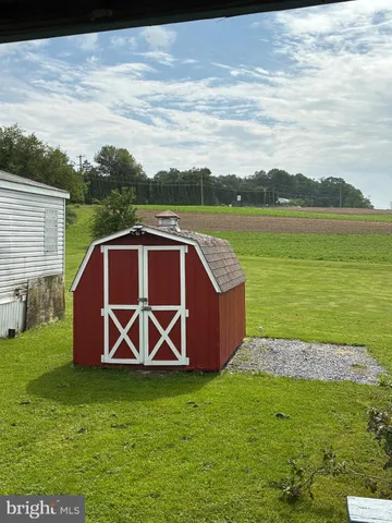 a view of a backyard with a garden