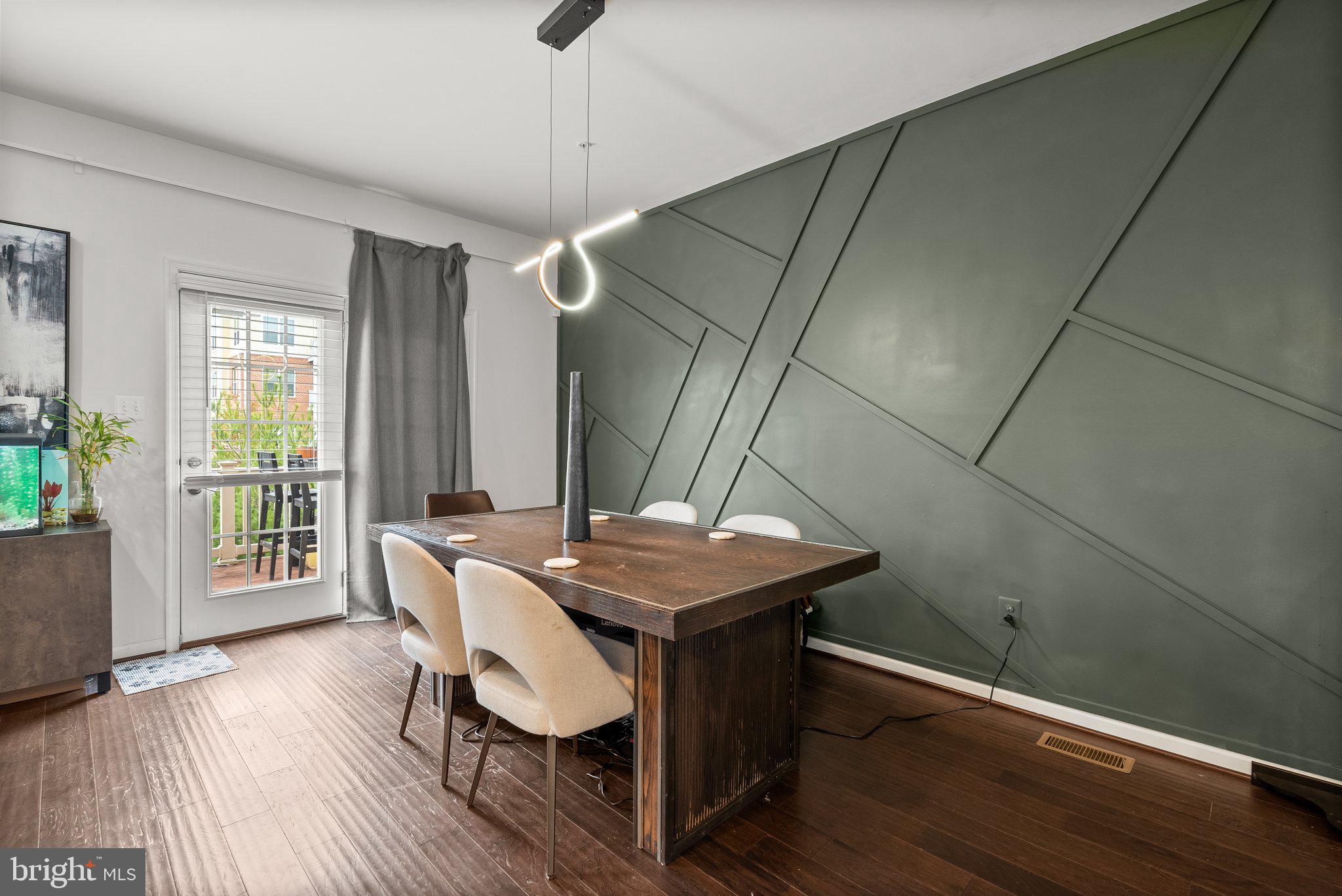 14407 Sandy Ridge Lane Laurel, MD 20707 - Photo 12 of 29 a view of a dining room with furniture window and wooden floor