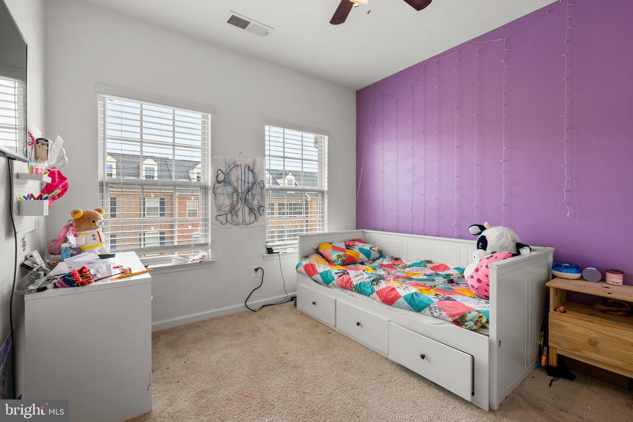 14407 Sandy Ridge Lane Laurel, MD 20707 - Photo 15 of 29 a bed room with furniture and a window