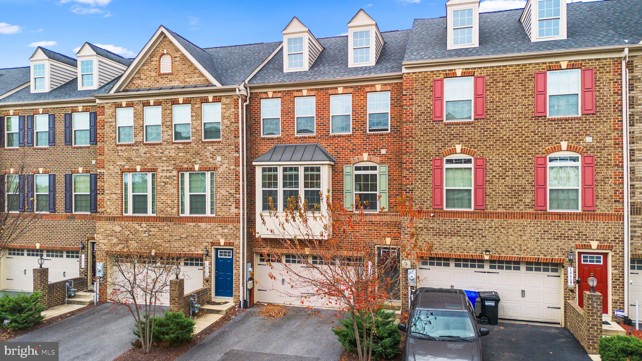 14407 Sandy Ridge Lane Laurel, MD 20707 - Photo 3 of 29 a view of a brick building with many windows