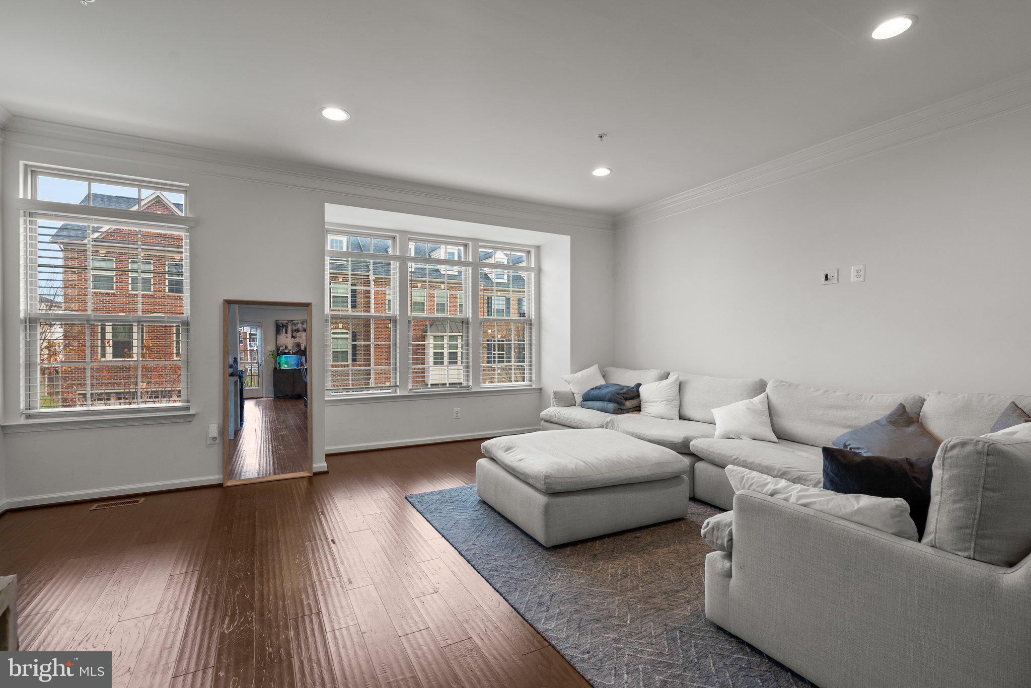14407 Sandy Ridge Lane Laurel, MD 20707 - Photo 4 of 29 a living room with furniture and a window