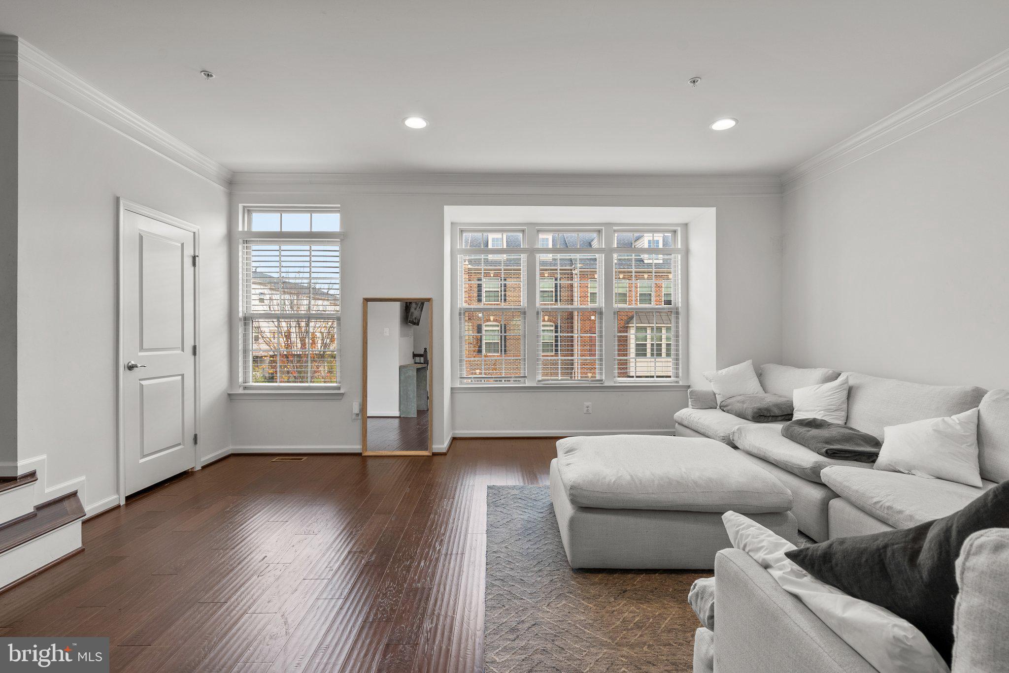 14407 Sandy Ridge Lane Laurel, MD 20707 - Photo 5 of 29 a living room with furniture and a large window