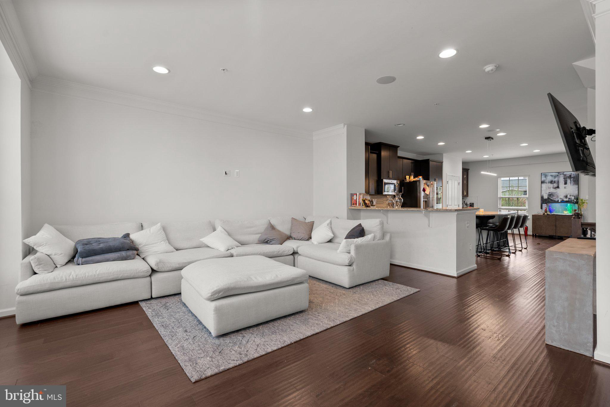 14407 Sandy Ridge Lane Laurel, MD 20707 - Photo 6 of 29 a living room with furniture and view of kitchen
