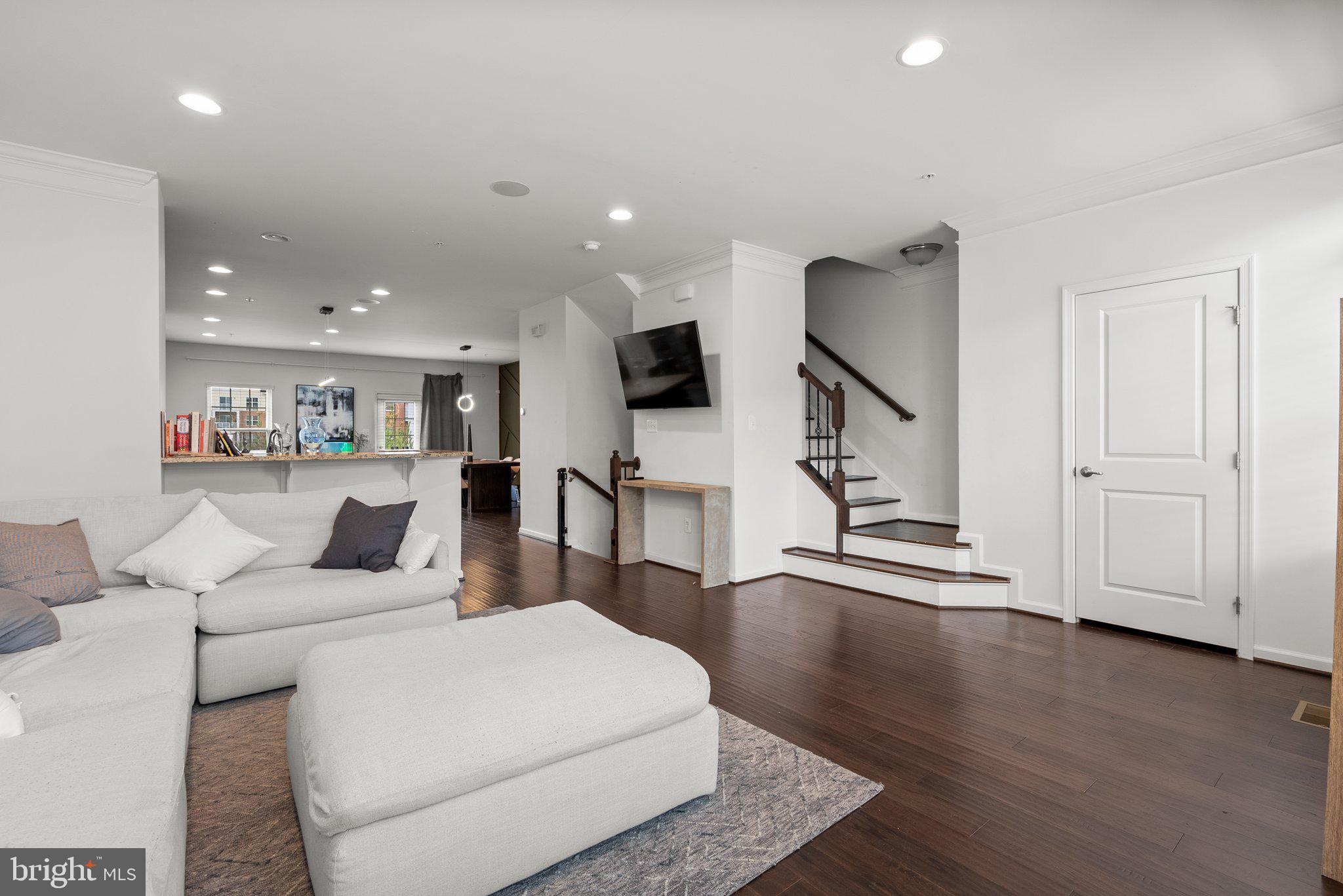 14407 Sandy Ridge Lane Laurel, MD 20707 - Photo 7 of 29 a living room with furniture and wooden floor