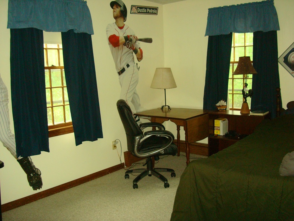 31 Stuart Road Rochester, MA 02770 - Photo 24 of 30 a view of a workspace with furniture and a window