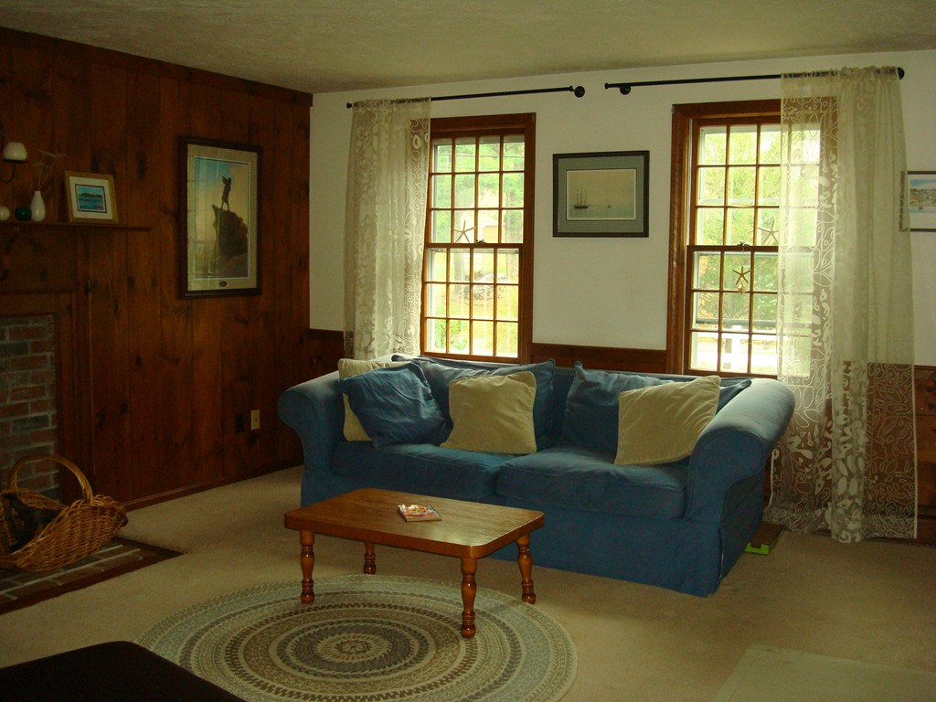31 Stuart Road Rochester, MA 02770 - Photo 8 of 30 a living room with furniture and a window