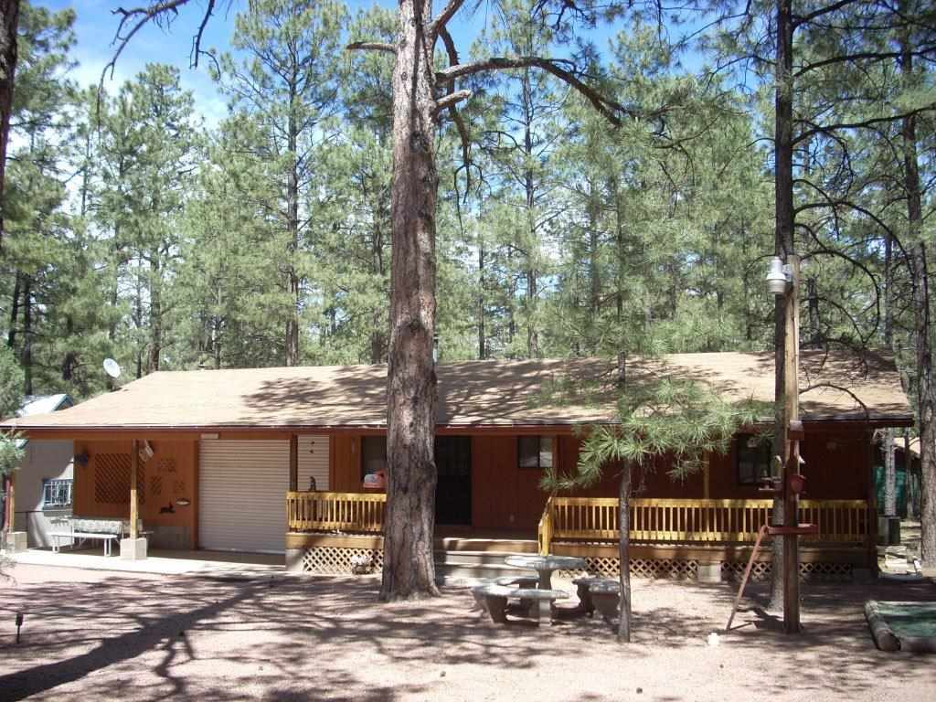 2923 Markham Road Overgaard, AZ 85933 - Photo 23 of 33 a front view of a house