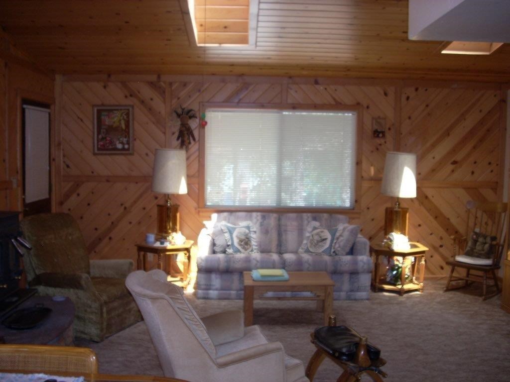2923 Markham Road Overgaard, AZ 85933 - Photo 5 of 33 a living room with couches and a fireplace