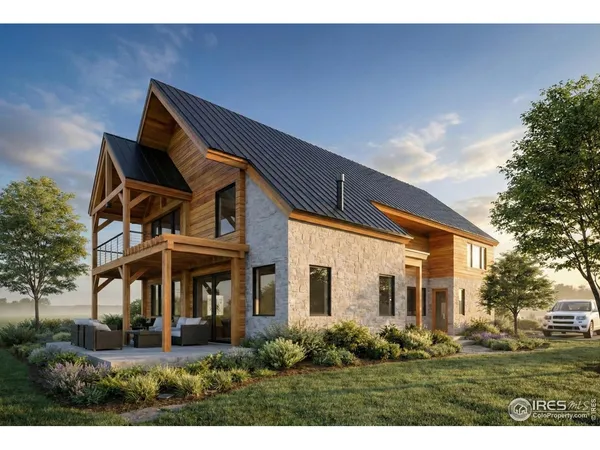 a backyard of a house with barbeque oven and outdoor seating